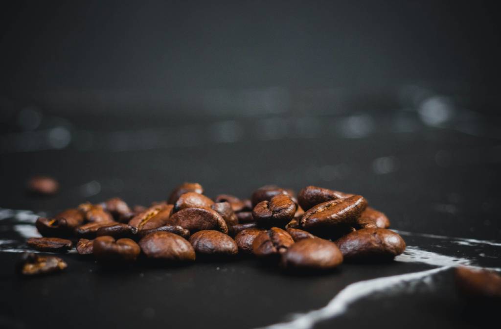 Decoding Coffee's Caffeine Chronicles: Dark Roast vs. Light Roast